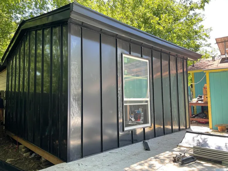 Black standing seam metal wall panels for Roof Inspection in Watertown